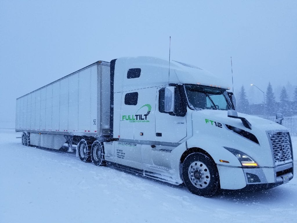 full tilt logistics truck in snow