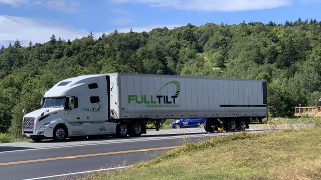 A Full Tilt Logistics truck completing trade show shipping.